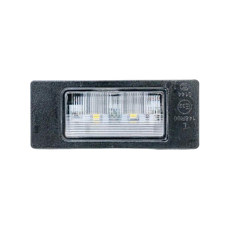 How does a license plate light safeguard driving safety and legal compliance within its small footprint?